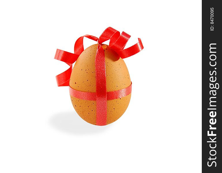 Egg With Ribbon On White.