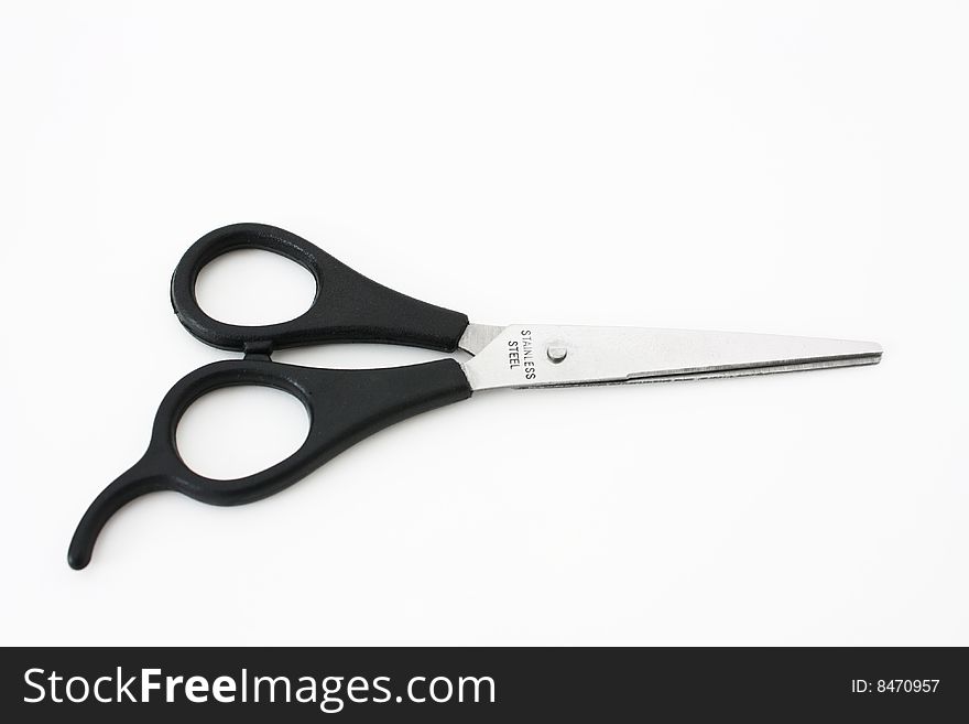 Black scissors isolated on white background