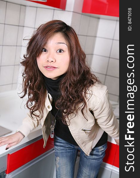 Young beautiful girl in    kitchen