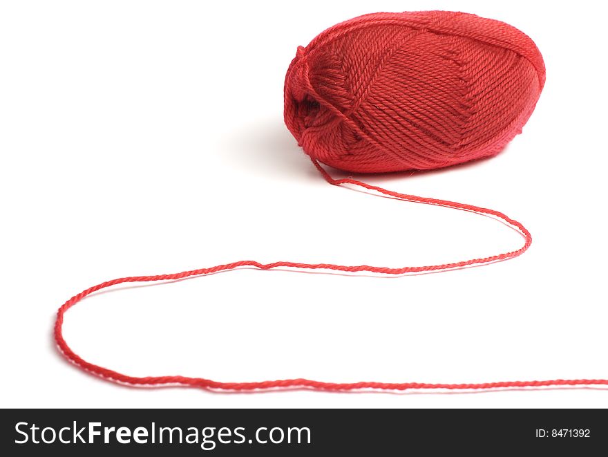 Woolen a thread for knitting red colors isolated on white