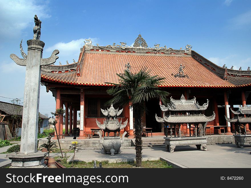 Three incense braziers and a dragon column stand in the courtyard of the beautiful small countryside Shi Fo Buddhist Temple in Pengzhou, China - Lee Snider Photo. Three incense braziers and a dragon column stand in the courtyard of the beautiful small countryside Shi Fo Buddhist Temple in Pengzhou, China - Lee Snider Photo.