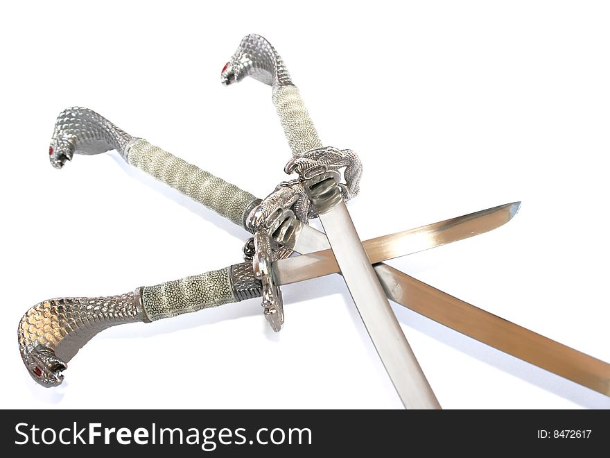 Three daggers isolated on white.