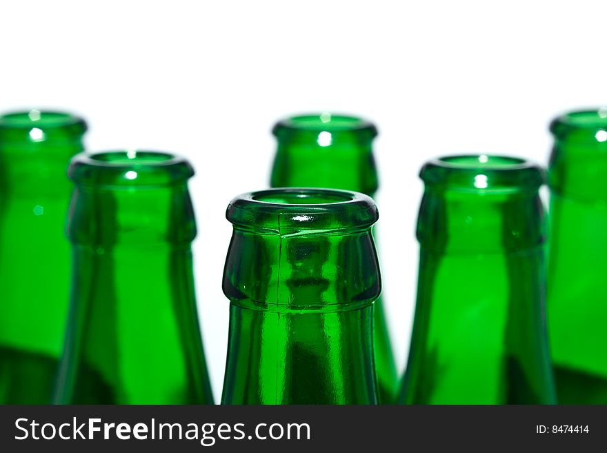 Green bottles on a white background