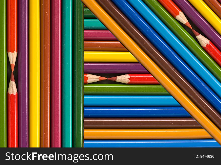 Many colored pencils abstract background