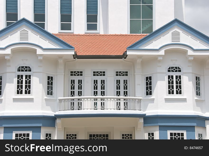 Colonial style architecture with small balcony