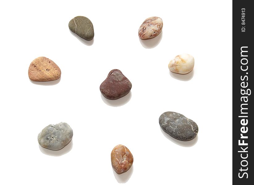 Colored stones for spa procedures on a white. Colored stones for spa procedures on a white.