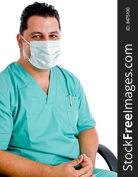 Male doctor posing with face mask