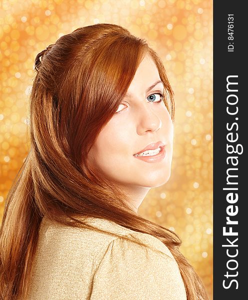 Attractive young woman over gold background. Attractive young woman over gold background