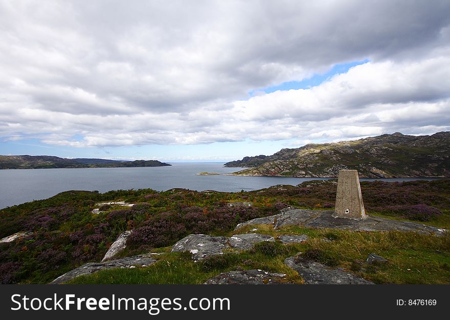 Stele and landscape of the highlands. Loch Torridon. Scotland. Stele and landscape of the highlands. Loch Torridon. Scotland.