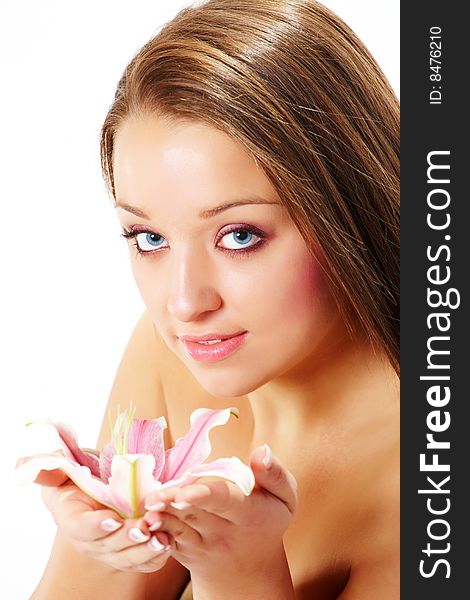 Portrait of beautiful young woman with lily flower. Portrait of beautiful young woman with lily flower