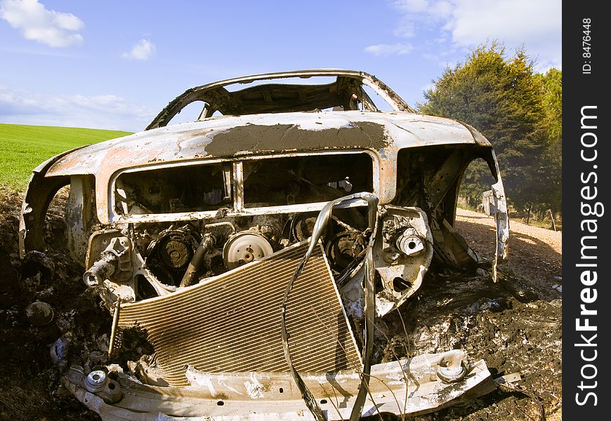 Stolen and burned car in the countryside