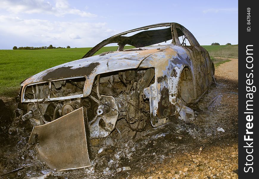 Stolen and burned car in the countryside