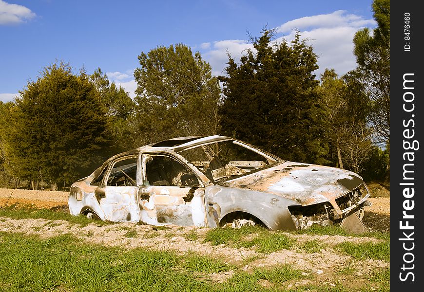 Stolen and burned car in the countryside
