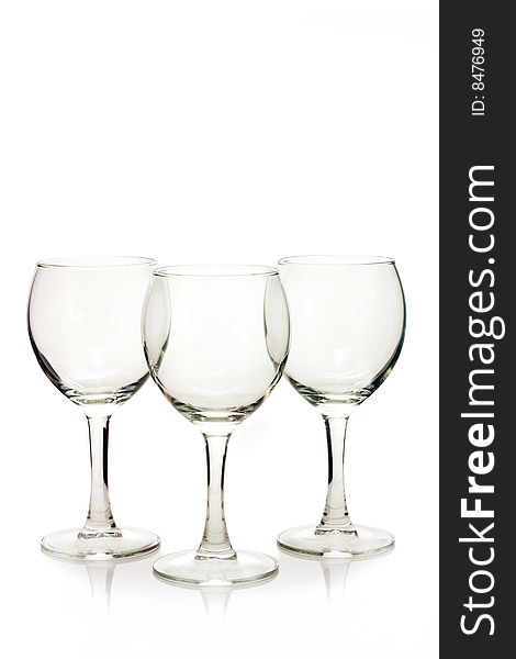 Several glass wine glasses on a white background. Several glass wine glasses on a white background