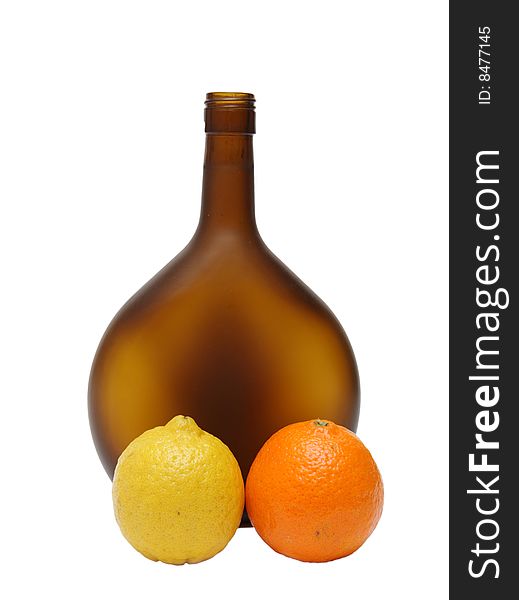 Brown bottle , lemon, apple isolated on a white background