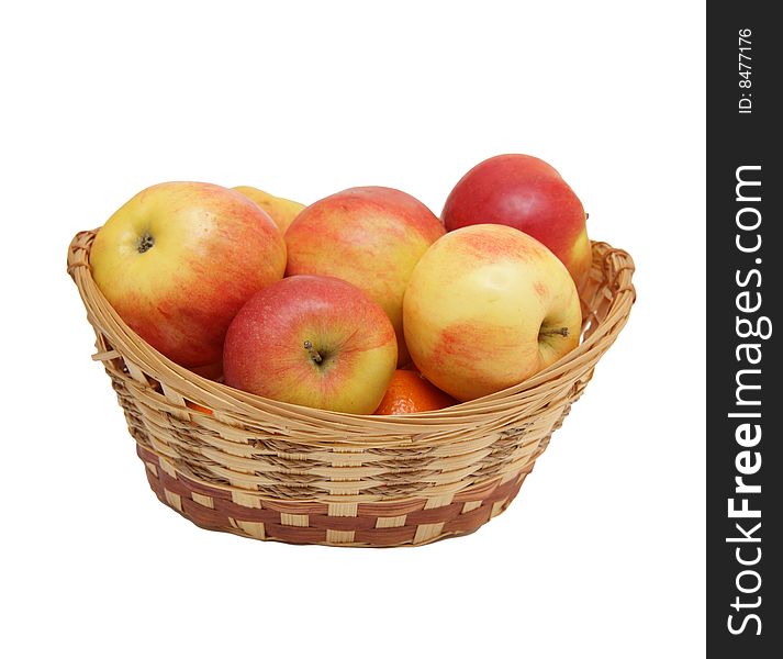 Basket with the apples isolated on a white background
