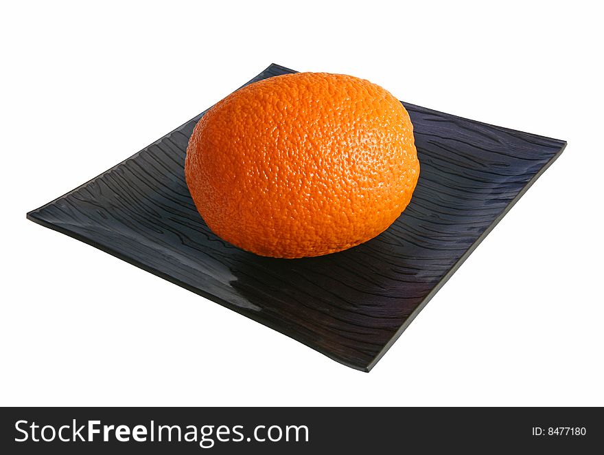 Orange on a glass  dish. Orange on a glass  dish