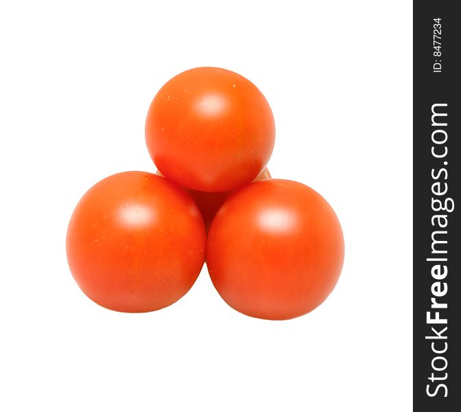 Three tomatoes isolated on a white background