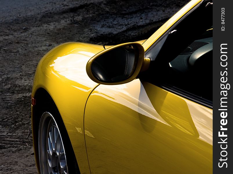 Picture of a sunny yellow car