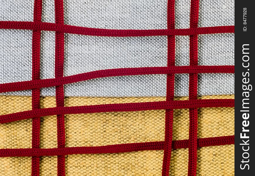 Yellow Sackcloth With Claret Laces In Macro Background