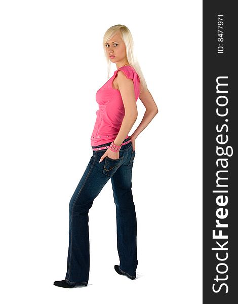 Blonde in a pink blouse blue jeans black shoes