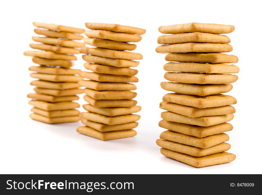 Three stacks of cookie isolated on white backgrounds