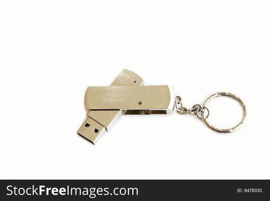 Silver USB memory key which can be folded isolated on white background