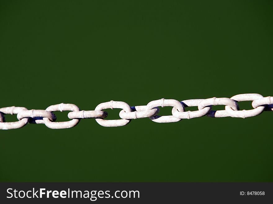 A chain with water as a background. A chain with water as a background
