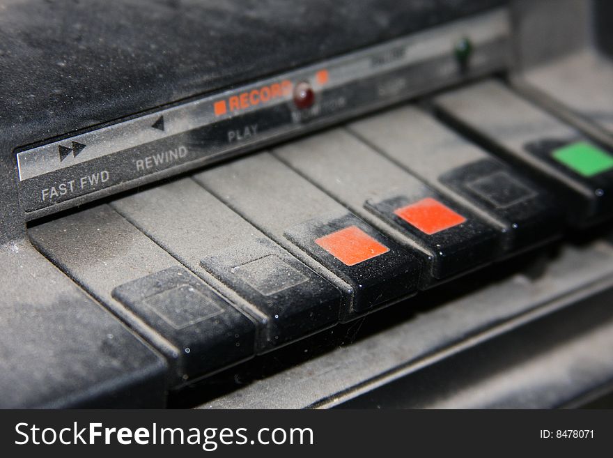 Close up of an dusty antique tape recorder. Close up of an dusty antique tape recorder