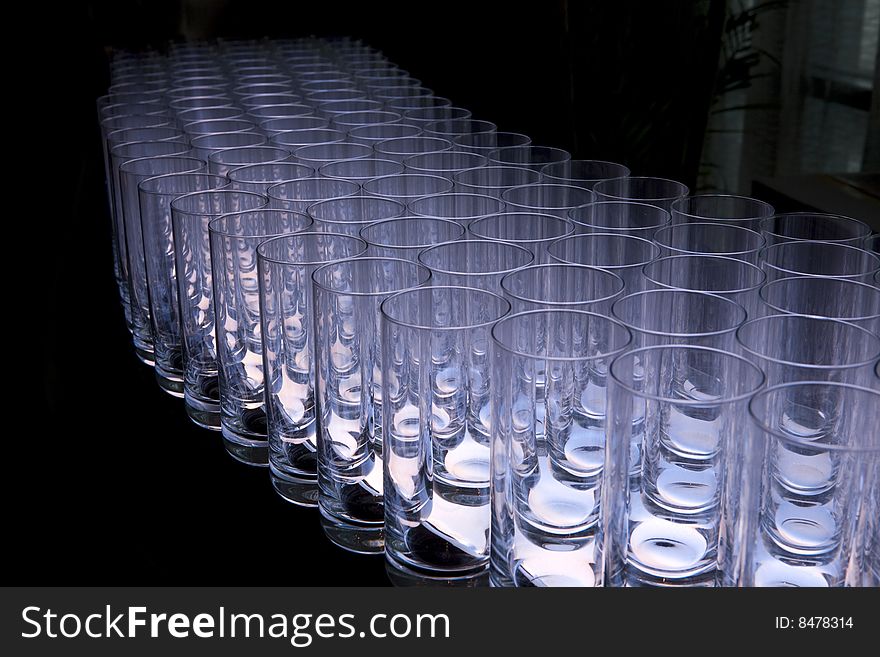 Empty glasses is orderly on a white lamp box