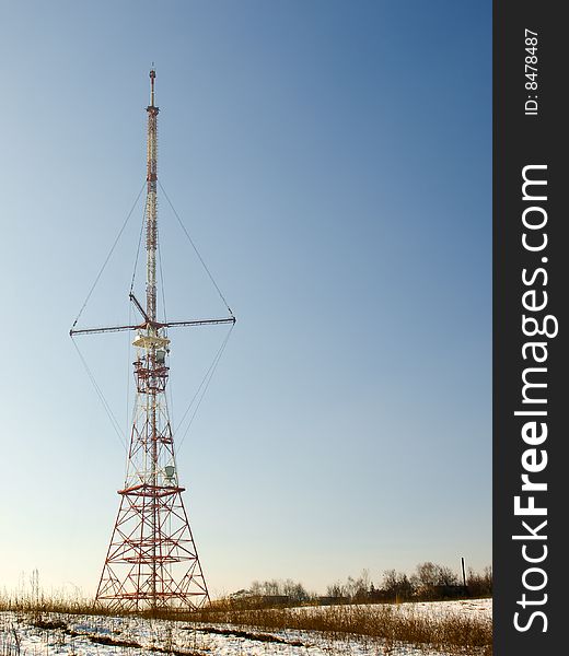 Red And White Antenna In Spring Field