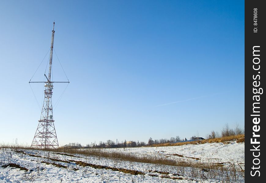 Red And White Antenna In Spring Field Horizontal. Red And White Antenna In Spring Field Horizontal
