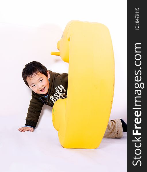 boy playing with toy horse