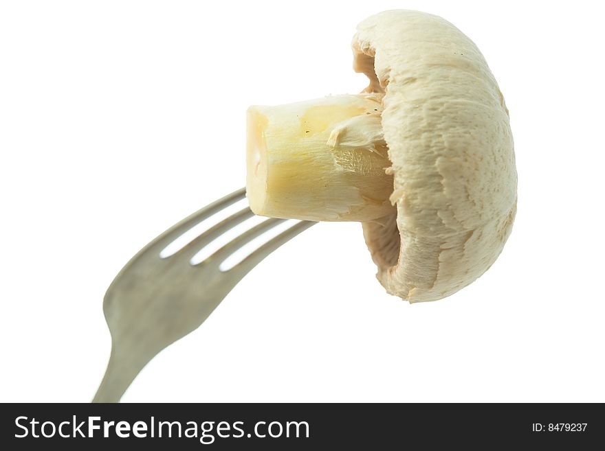 Stock photo: an image of a mushroom on the fork