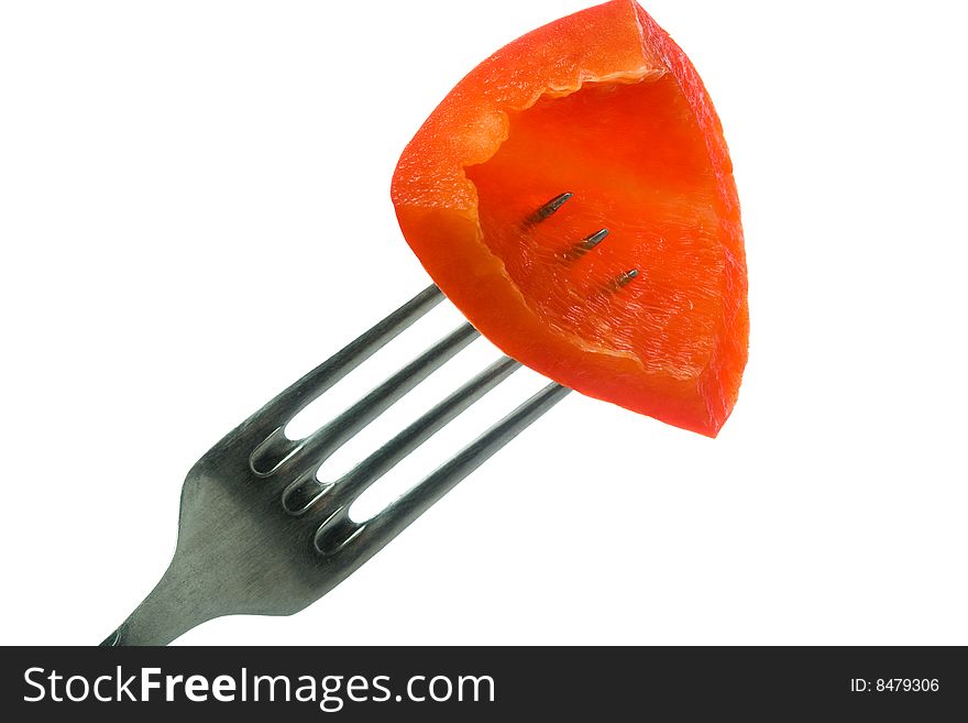 Stock photo: an image of a piece of paprika on the fork