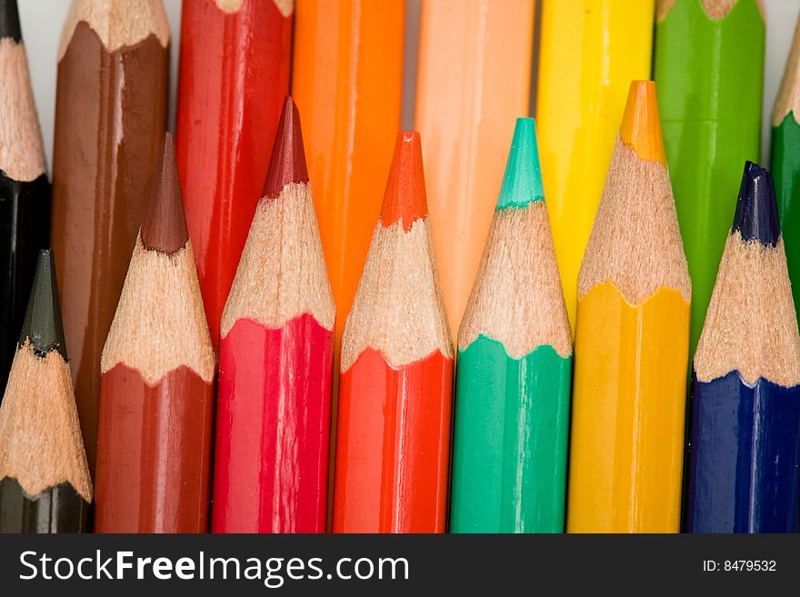 Stock photo: an image of row of various coloured pencils. Stock photo: an image of row of various coloured pencils