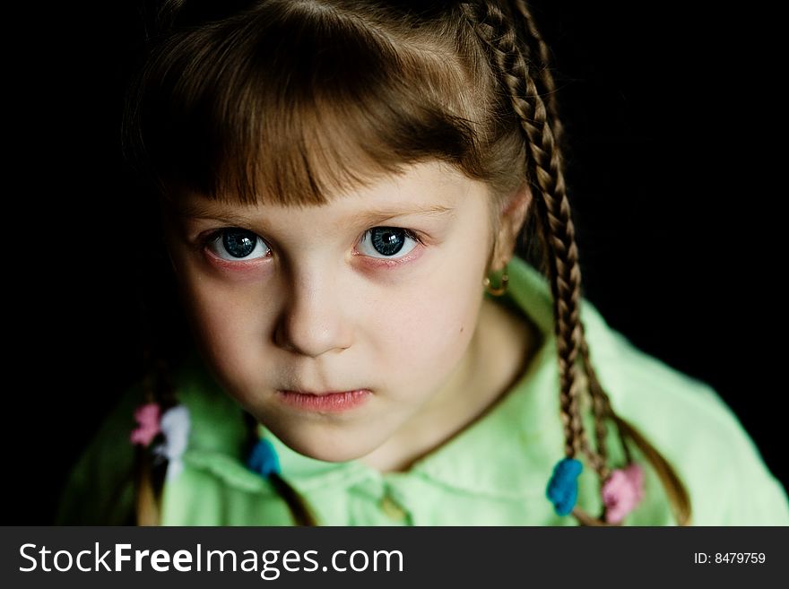 Stock photo: an image of a little girl with pigtails