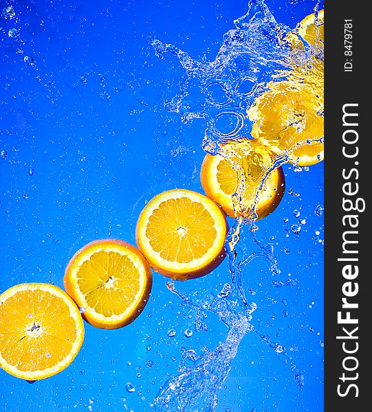 Orange with creative splashing water