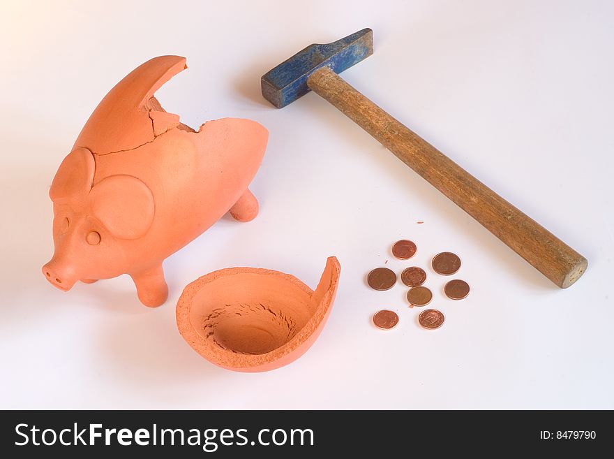 Piggy bank with very little money in