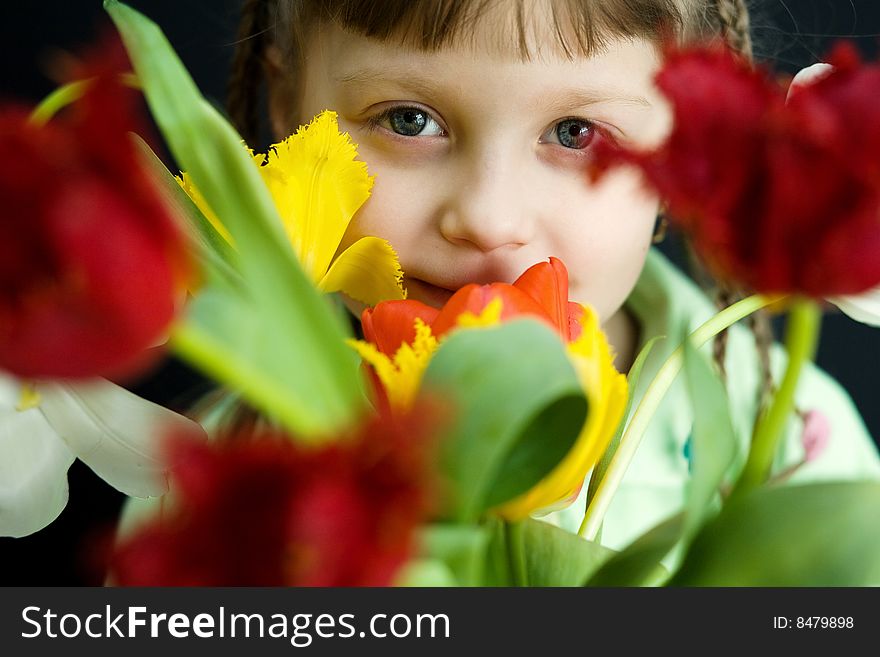 Stock photo: an image of a beautiful girl with a bouquet. Stock photo: an image of a beautiful girl with a bouquet