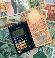 International Currencies With Calculator. Stock Photography