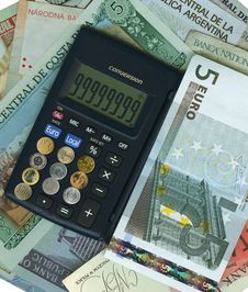 International Currencies With Calculator. Stock Photos