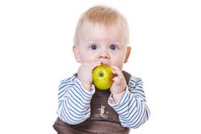 Little Boy Eating Fresh Apple Stock Photos