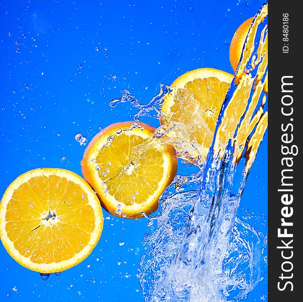 Orange with creative splashing water