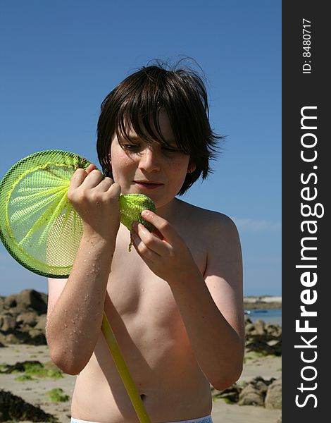 Boy with a fishing net. Boy with a fishing net