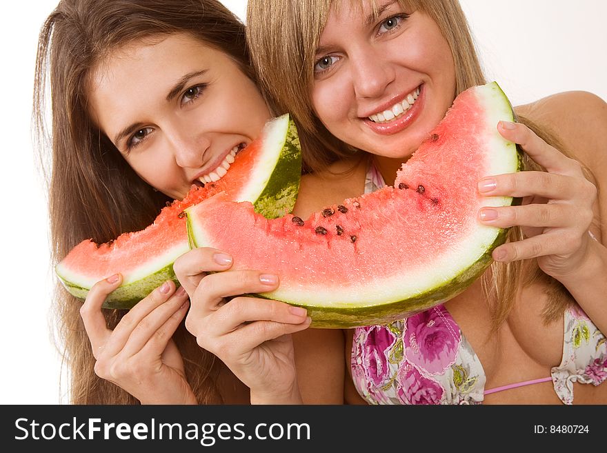 Sexy girls in bikini eating watermelon. Sexy girls in bikini eating watermelon