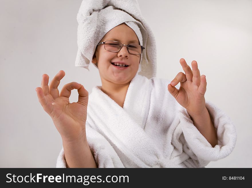 Funny Looking Kid With Bathrobe And Towel