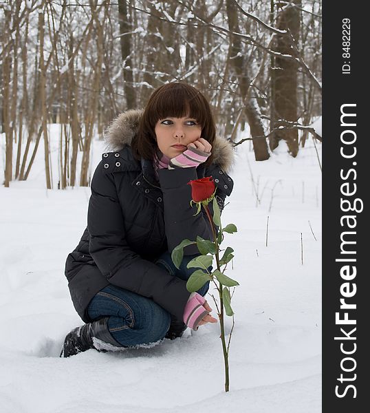 Young and beautiful Girl with rose tenderness