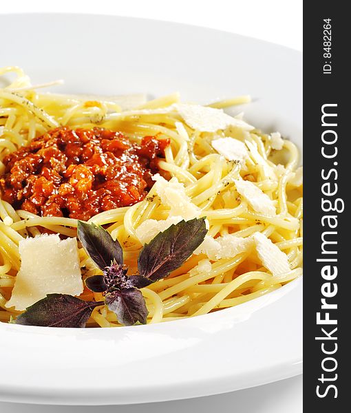 Spaghetti with Bolognese Sauce and Cheese. Isolated on White Background