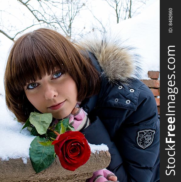 Young and beautiful Girl with rose tenderness
